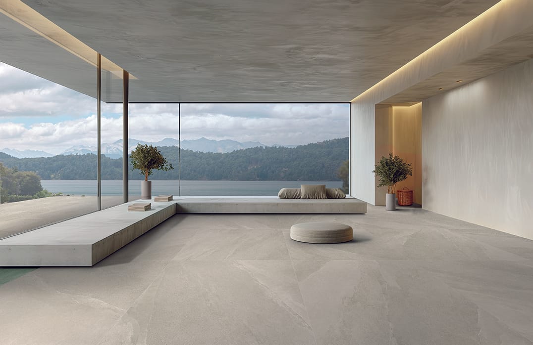 Living room with leather armchair on empty dark blue wall background